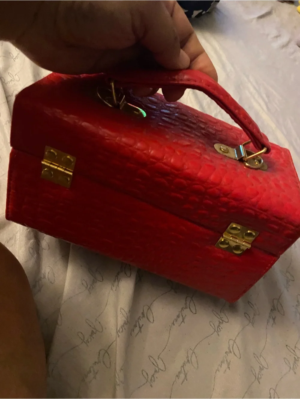 Red Textured Cosmetic Jewelry Case with Gold-Tone Clasp